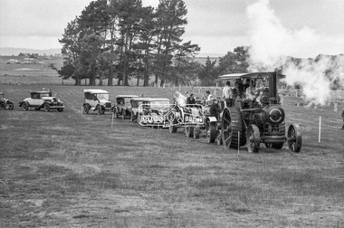 Photograph, George Coop, John Fowler & Co. Steam Traction Engine heads a parade of vehicles at Lake Goldsmith Steam Rally, Beaufort, Vic, c.1971