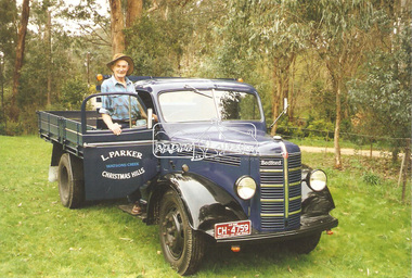 Photograph, Len Parker with his restored Bedford truck, 1999