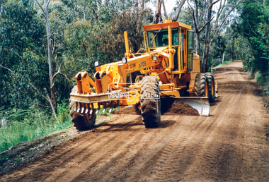 Photograph - Colour Print, Eltham Shire Council, Council oerations road grading and gravel water truck, c.1990