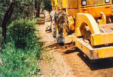 Photograph - Colour Print, Eltham Shire Council, Council oerations road grading and gravel water truck, c.1990