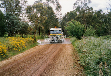 Photograph - Colour Print, Eltham Shire Council, Council oerations road grading and gravel water truck, c.1990