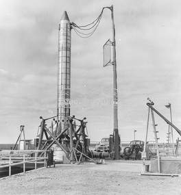 Photograph - Black and White Print, Weapons Research Establishment (WRE), Black Knight Rocket on launch pad at Woomera, South Australia, 23 September, 1958