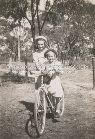 Photograph, Pam Ingram (on bike) and Valerie Feldbauer at Thomas Street, Eltham, c.1948