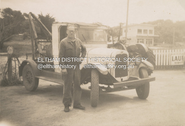 Photograph, Kenneth Douglas Ingram with his tow truck at Anglesea, c.1950