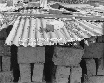 Photograph (Item) - Print, Untitled (Mudbricks under  corrugated shelter), 1988