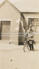 Photograph, Unidentified Reverend with bicycle, c.1939
