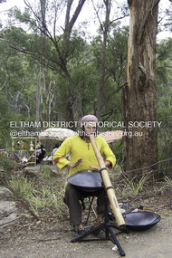 Photograph - Digital Photograph, Marguerite Marshall, Jesse Tree playing the Didgeridoo and Swiss Hang Drum at St Andrews Market, 29 March 2008