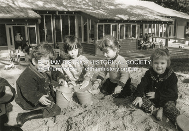 Photograph - Black and White Print, Shire of Eltham, Meruka Child Care Centre, four children in sandpit, c.1994