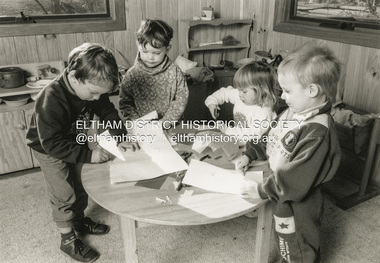 Photograph - Black and White Print, Shire of Eltham, Hohnes Road Playhouse, four children at activity table, c.1994