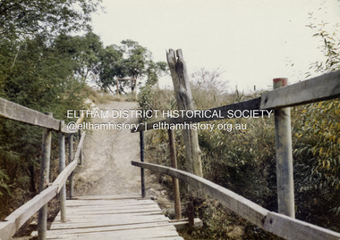 Colour Print, David Taylor, Footbridge over the Diamond Creek, Dalton Street Lane, Eltham. View heading west towards Bell Street, c.1976
