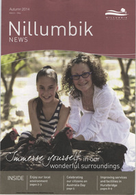 Cover image of a young girl in a black and white striped summer sleeveless top kneeling. She has her long hair pulled back in a tight pon tail. She is close to a an older woman, potentially her grandmother with curly hair and black rimmed glasses wearing an all white top and skirt or dress close to choolks with black feathers and red crests and gills at Edendale Farm on a sunny day.