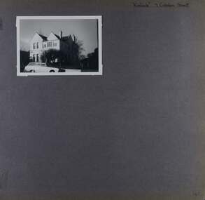 One photo on page - old double storey mansion with old car in front
