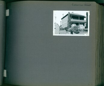 One photo on page - 2 storey old mansion with balcony and verandah in its garden