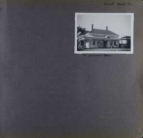 One photo on page - an old weatherboard house with a verandah