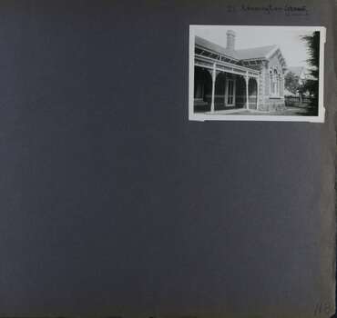 1 photo - old brick home of one storey with a verandah