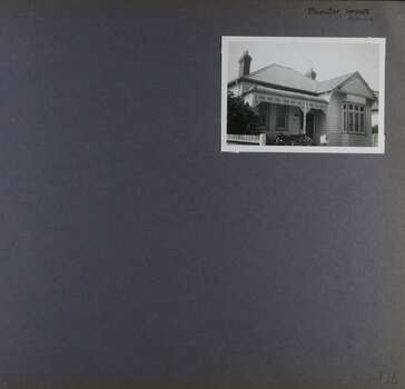 1 photo - old-style timber home with a verandah and decorative cast iron
