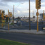 Multi road lane intersection with traffic lights.