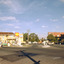 Intersection with petrol station on corner.