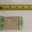 Linen thread on green card