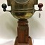 4 views of binnacle; side, top, detail of compass and plaque.