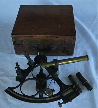 A sextant in wooden box as used by P. J. Larkin, government marine surveyor.