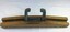 An adjustable rowlock made of a timber block with metal rowlocks which stow away inside the block when not in use.