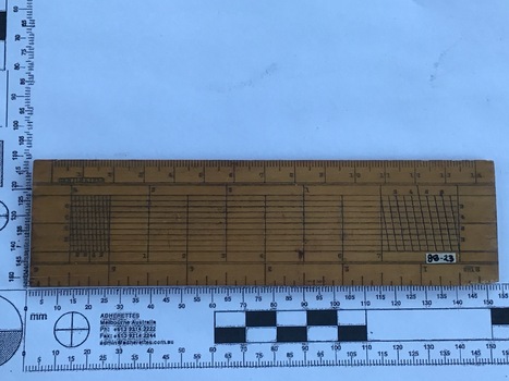 A wooden ruler used for navigational calculations [back  views]