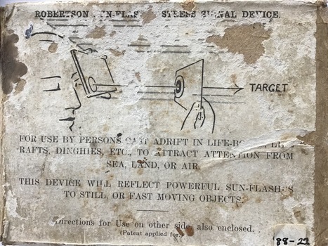 Cardboard box with instructions on top which are damaged