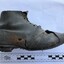 A child's well worn black boot found under the floor of a pilot's terrace house in Gellibrand Street Queenscliff. It is over 170 years old and was probably put there by the family during construction for good luck or to ward off bad luck