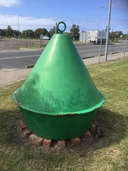 7 assorted marker buoys of various shapes and colours; black, green, red and yellow. Two are made of steel and 5 of fibreglass.