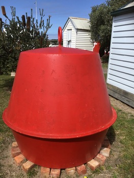 7 assorted marker buoys of various shapes and colours; black, green, red and yellow. Two are made of steel and 5 of fibreglass.