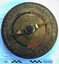 Circular brass plaque inscribed with J5 North Sea 1917 1918 made from a piece of navigational equipment used on the submarine J5 mounted on wood