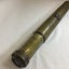Side view of brass gun sighting telescope