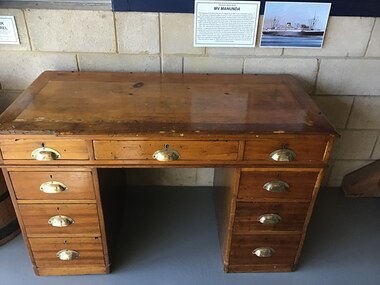 Timber finished desk.