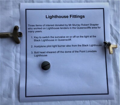 Key to switch sunvalve on or off, acetylene pilot light burner and a bolt head sheared off the dome of the Point Lonsdale Lighthouse.