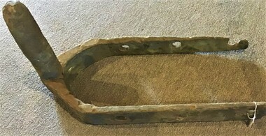 A pair of cast iron gudgeon fittings suitable for a rudder from an unknown wreck