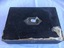 Black portable writing desk with brass handle; closed view