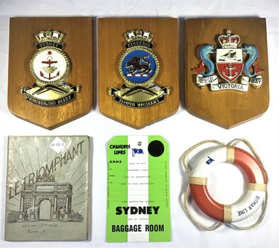 Ships' plaques for 'Sydney', 'Cerberus', 'Victoria'. Sitmar Line souvenirs, School Book.