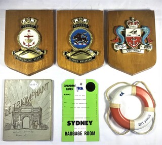 Ships' plaques for 'Sydney', 'Cerberus', 'Victoria'. Sitmar Line souvenirs, School Book.