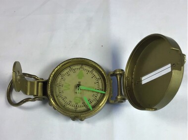 A small hand held engineer compass shown in the open position.