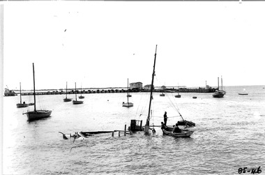 Ports & Harbours survey launch Bass with tow rope tothe Ports & Harbours survey launch Flinders which sank in 1953