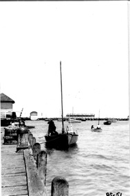 Black & white photograph of the Couta boat "Lila" about to tie-up at Fisherman's Pier