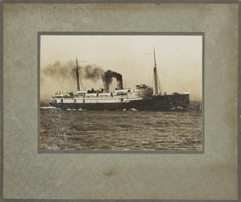 A B&W photoraph mounted on cardboard backing of the SS Loongana