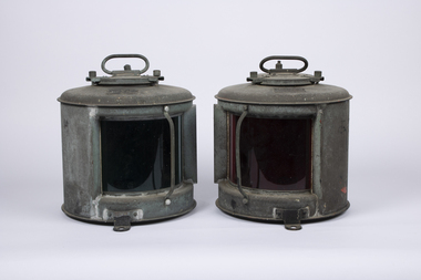 Three navigational light canasters, Port with red glass and starboard with green glass and head light with clear glass.