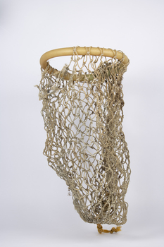 a suspended view of a mussel bag made of plastic tube and rope.