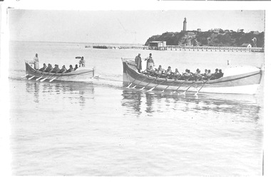 black & white photo of both Queenscliffe lifeboats under oar c1920