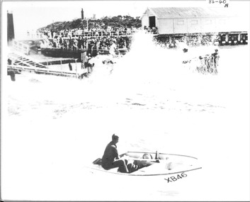 Black & white photograph of the seaward view of lifeboat the Queenscliffe launching c1930