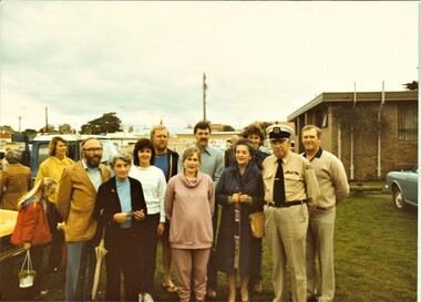 Colour photo of Queenscliffe organisations representatives receiving a cheque from the market