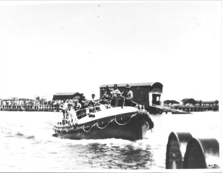 Lifeboat QUEENSCLIFFE under way at Fisherman's Pier, circa 1929-30 after the Lifeboat Shed was built