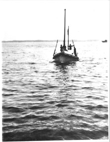 black & white photograph of the Lifeboat QUEENSCLIFFE with masts stepped.